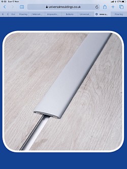 Self adhesive threshold door strip available in chrome, brass or colour matching. We have every colour FC 1-75 Nationwide delivery available www.flooringnearme.SimDif.com shop now save ££s